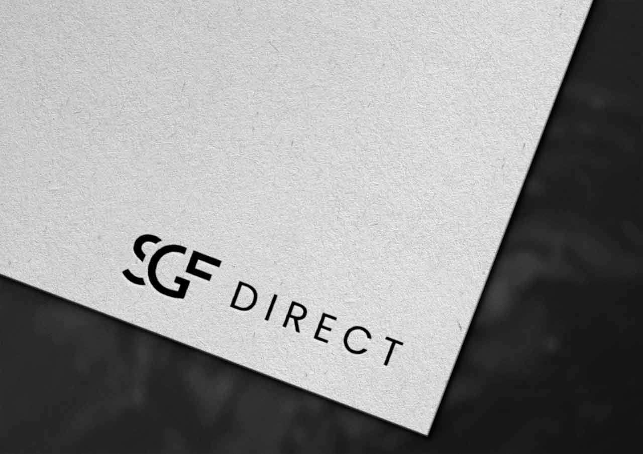 Monochrome logo design for SGF Direct printed on textured paper, showcasing clean typography and minimalistic visual identity design.